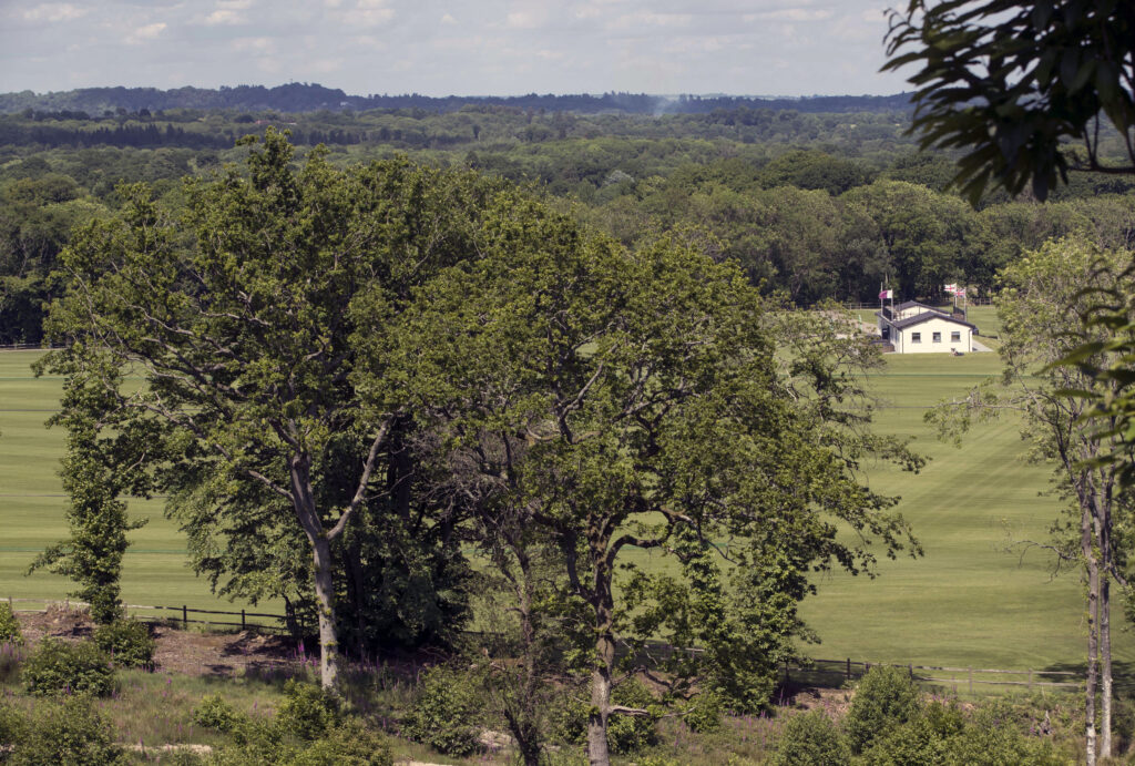 rivate clubhouse at Cortium, Surrey equestrian estate, reflecting traditional British equestrian values